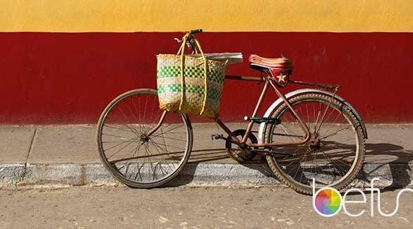bike-with-yellow-wall-min
